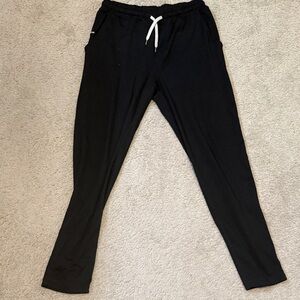 Vuori Black Joggers with White Accent